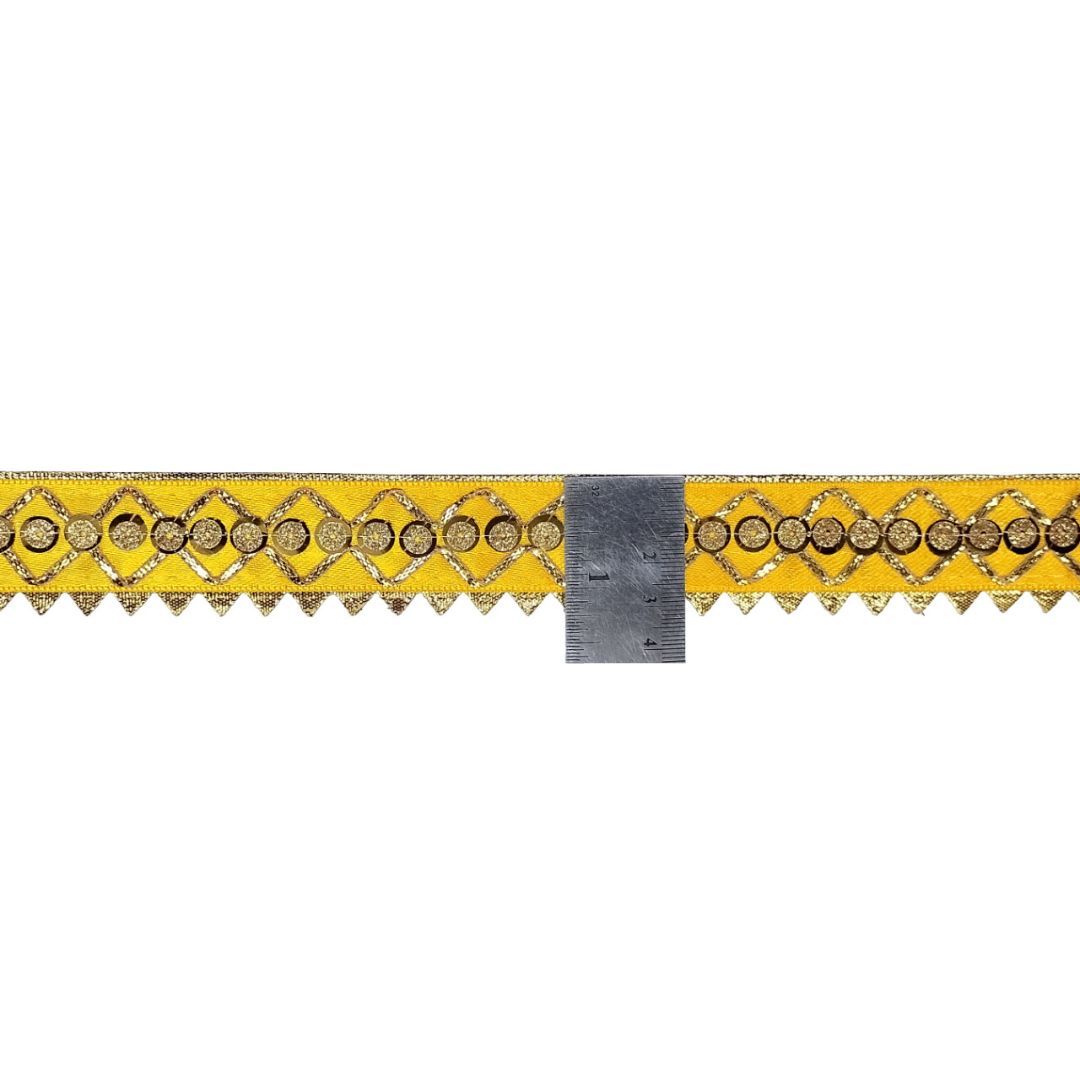 Decorative border with gold pattern on a yellow background